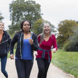 Image of medium shot women staying active